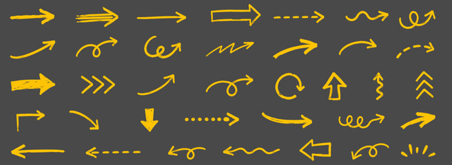 Fototapeta premium Hand drawn chalkboard arrow set with white brush lines, curved pointers, scribble waves, swirl strokes and playful school doodles on black background, vector illustration