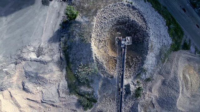 Aerial top down view of industrial lime kiln processing
