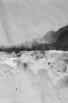Grunge black and white canvas flax denim fabric with painting stain grain smear blot. Art Textured abstract blank background.