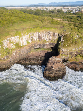 Aerial View of Morro da Guarita with Waves Crashing in Torres, Brazil