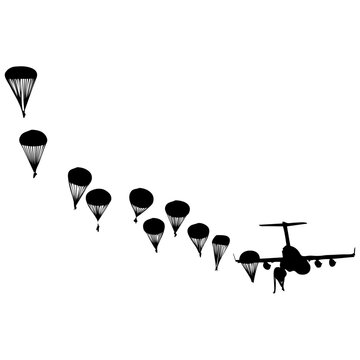 paracaidistas saltando de un avi&oacute;n militar