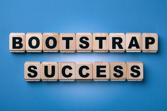 Bootstrap success phrase written on wooden tiles over a blue background