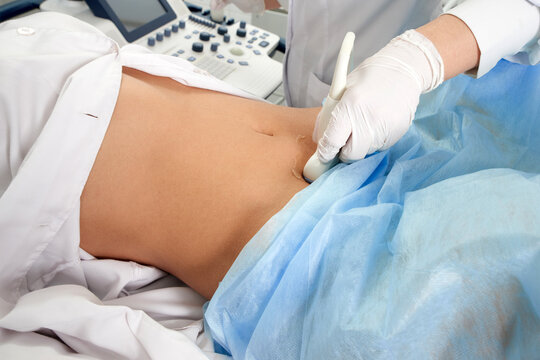 Cropped view of woman at gynecologist's doing ultrasound scan