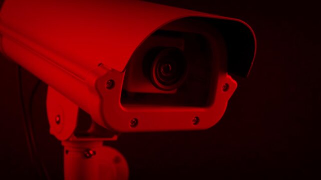 Passing CCTV Camera In Red Security Light