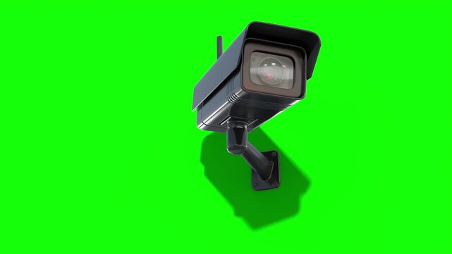 Static outdoor CCTV security camera with a blinking red LED indicator on a green screen background.