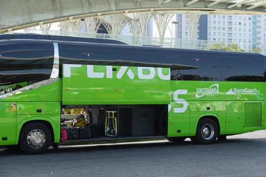 Lisbon, Portugal - July 9, 2026: A FlixBus long-distance coach parked with its luggage compartment open at Lisbon Oriente station. The image shows passengers' luggage being loaded before departure