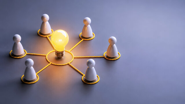 Connected people surrounding a glowing light bulb, knowledge sharing and team collaboration concept with copy space