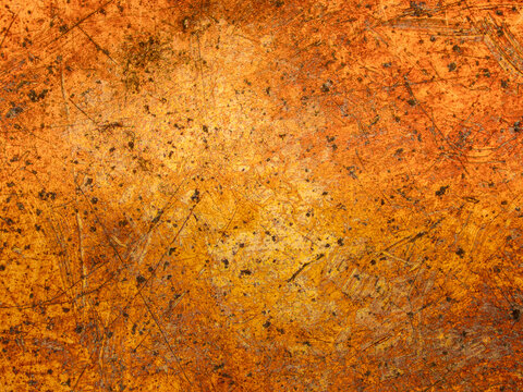 Microscopic view of scratched polished gold surface under microscope