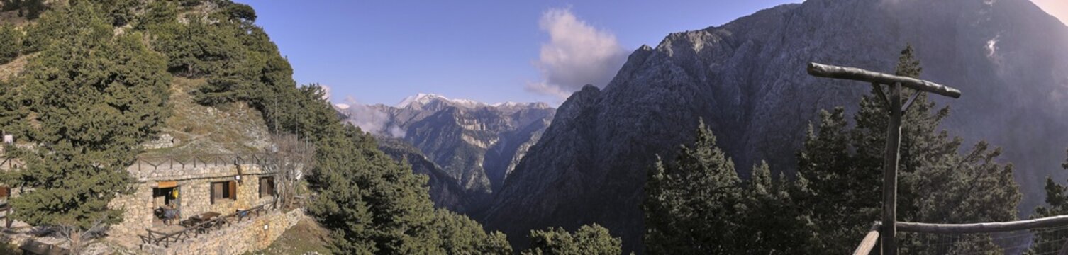 Panorama photo, snow-capped mountains, entrance to gorge, entrance, Xyloskalo, ranger, house in rock, Samaria Gorge, Omalos, Lefka Ori, White Mountains, West Crete, island of Crete, Greece