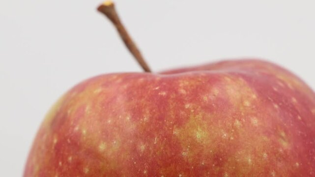 Red apple in slow motion.