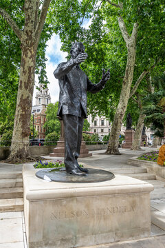 Bronze statue of Nelson Mandela by Ian Walters (unveiled 2007), on a Portland stone base, Parliament Square, Westminster. First black person commemorated in the square, London, UK. 