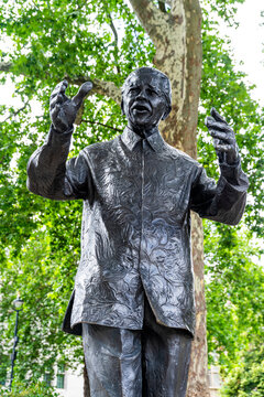 Bronze statue of Nelson Mandela by Ian Walters (unveiled 2007), on a Portland stone base, Parliament Square, Westminster. First black person commemorated in the square, London, UK. 