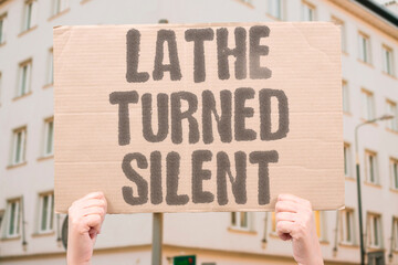 "Lathe Turned Silent" Machine stopped mid-cut, tool jammed. LATHE. TURNED. SILENT. MACHINE. JAMMED. © AndriiKoval