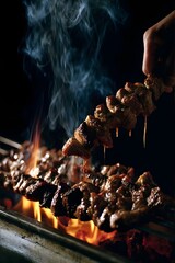 Fototapeta premium Grilled lamb skewers with rendered fat and rising smoke