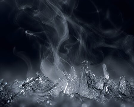 Ice crystals sublimating directly into vapor creating dark macro winter transformation scene frozen vapor effect