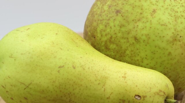 Rotating pear fruit in slow motion.
