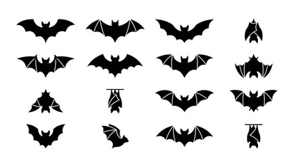 Fototapeta premium A collection of various black silhouette bat icons, showing them in flight and hanging upside down.