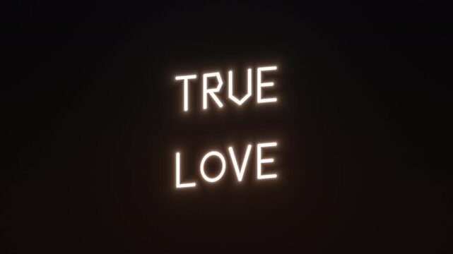 Bright glowing text displaying true love in dark background