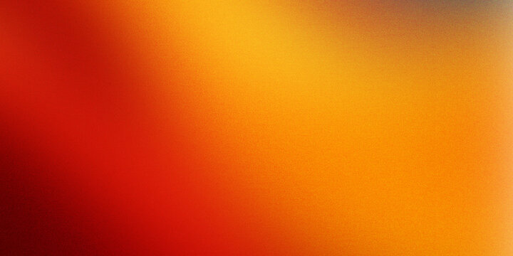 Warm abstract orange and red gradient background with textured grain effect abstract gradient