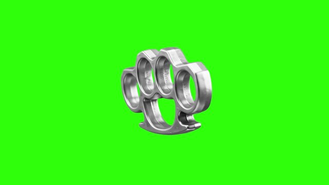 Shiny steel brass knuckles or knuckle duster floating diagonally against a bright green screen keying background. Great for action movie visual effects, crime fighting trailers, street combat videos, 