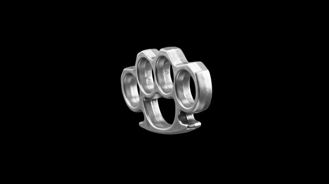 A detailed 3D model of heavy silver metal brass knuckles floating at an angle against a solid dark black studio backdrop. Designed for action crime movie trailers, street fight game assets, tactical g