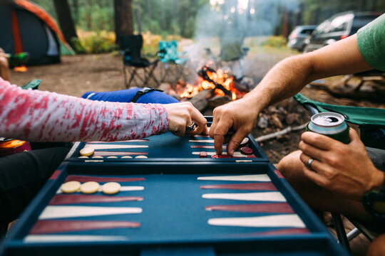 couple playing backgammon