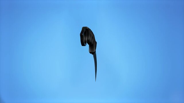 A black tactical karambit knife with a curved blade and ergonomic handle hangs vertically against a light blue background.