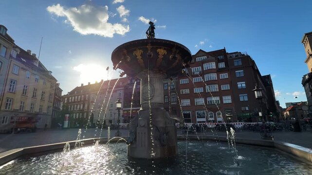 Caritas Well fountain in Gammeltorv square, Copenhagen city, Denmark