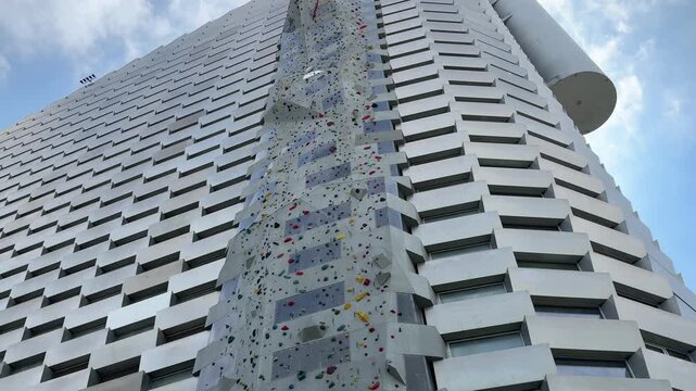 Low angle view of tall climbing wall at CopenHill, Copenhagen city, Denmark