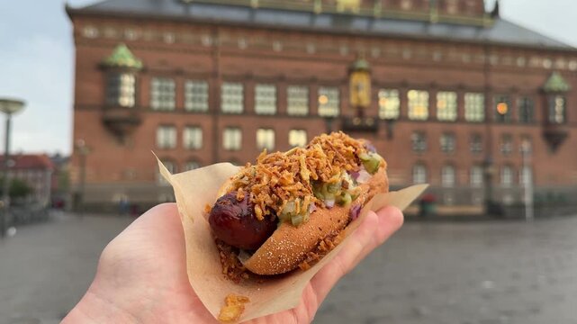 Traditional Danish hot dog at City Hall square in Copenhagen city, Denmark