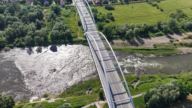 Drone shot of Jozef Pilsudski (Helenski) Bridge over Dunajec river, Nowy Sacz
