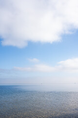 Fototapeta premium clouds over calm sea