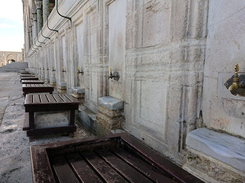 Ottoman ablution area with brass taps at Suleymaniye Mosque in Istanbul