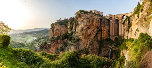 Panoramic view of ancient city of Ronda and bridge spanning Tajo Gorge © Pete Niesen Photo