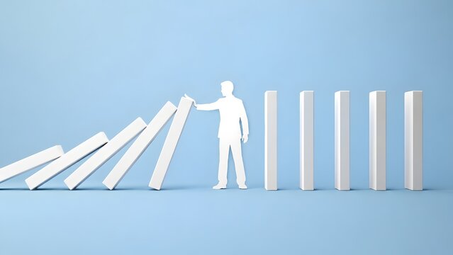 Business crisis management and risk prevention concept with a paper cutout businessman stopping falling dominoes