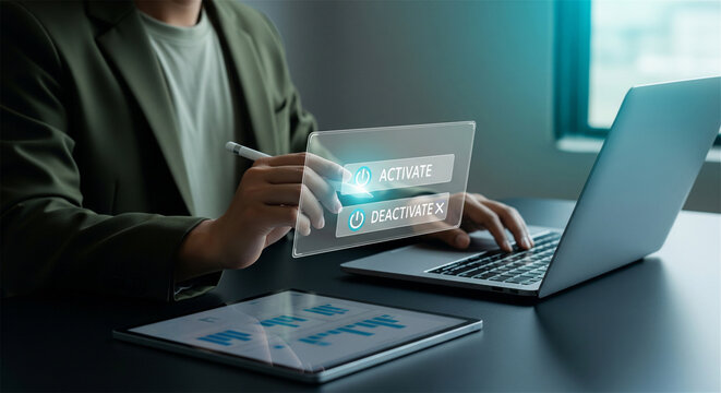 Futuristic virtual interface with activate and deactivate buttons, businessman working on laptop with digital hologram screen, modern cybersecurity concept