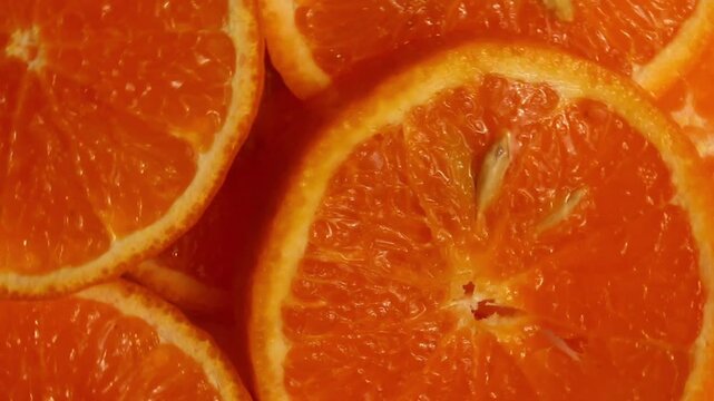 top view of stacked orange slices as a background
