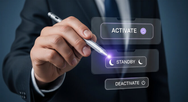 Businessman using stylus on virtual screen, selecting standby mode on digital interface