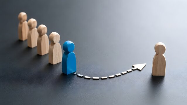 Career growth leadership path showing unique blue figure stepping forward from crowd towards target arrow destination
