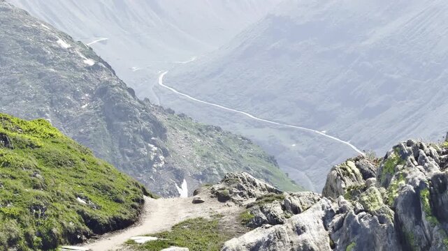 Slow motion reveal over a glacially polished granite ridge