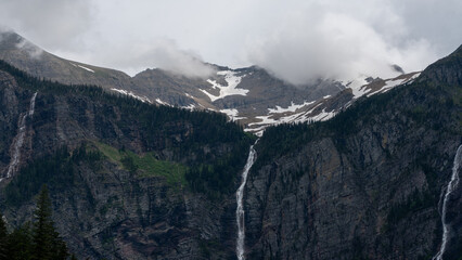 Foggy Mountain Valley with Waterfall © Tianqi