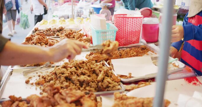 Vegetable sell in tradition market food with people hand grab Thailand