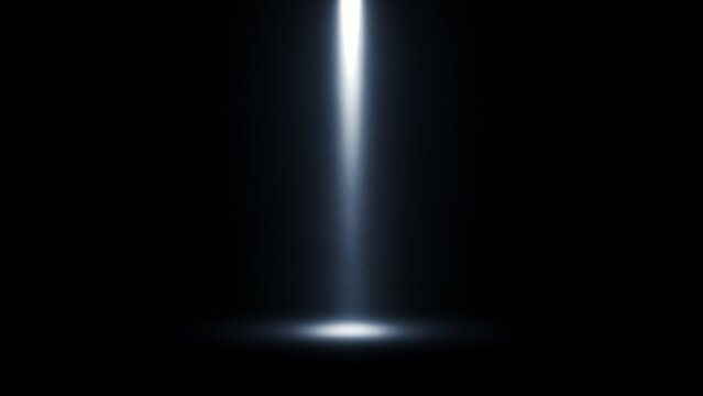 Bright vertical light beam on black background dramatic illumination