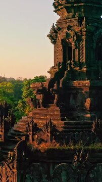 Bajra Sandhi or Monumen Taman Mumbul monument to the struggle for independence in the rays of the rising sun. Bali, Indonesia. 4K Aerial view