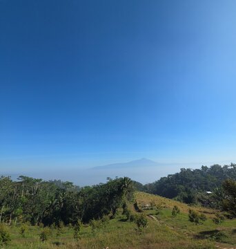 mountain landscape with blue sky and clouds