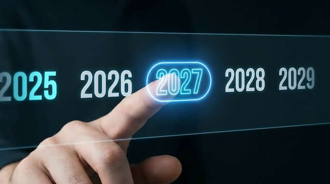 Business professional pressing digital 2027 button on futuristic screen interface for corporate growth planning strategy development vision concept for future industry success goals.