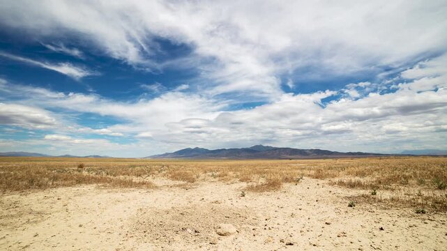 Timelapse looking over the dry desert in the Utah summer during extreme drought season in Tooele County.