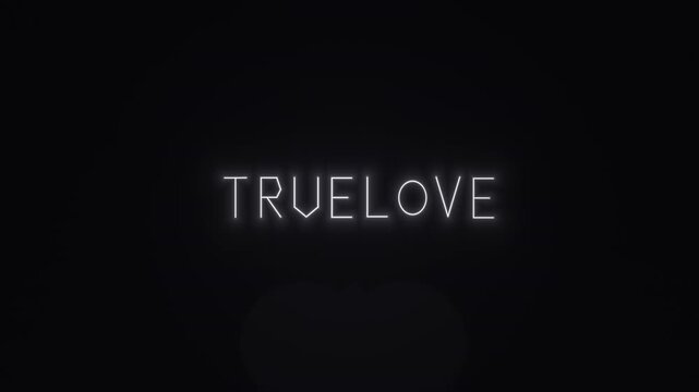 Light display showing the words true love on a dark background