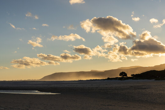 low tide at sunset and dusk, Grotto Beach, Hermanus, South Africa