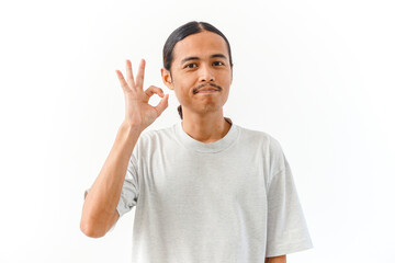 Naklejka premium Young Asian Man Gesturing OK Sign